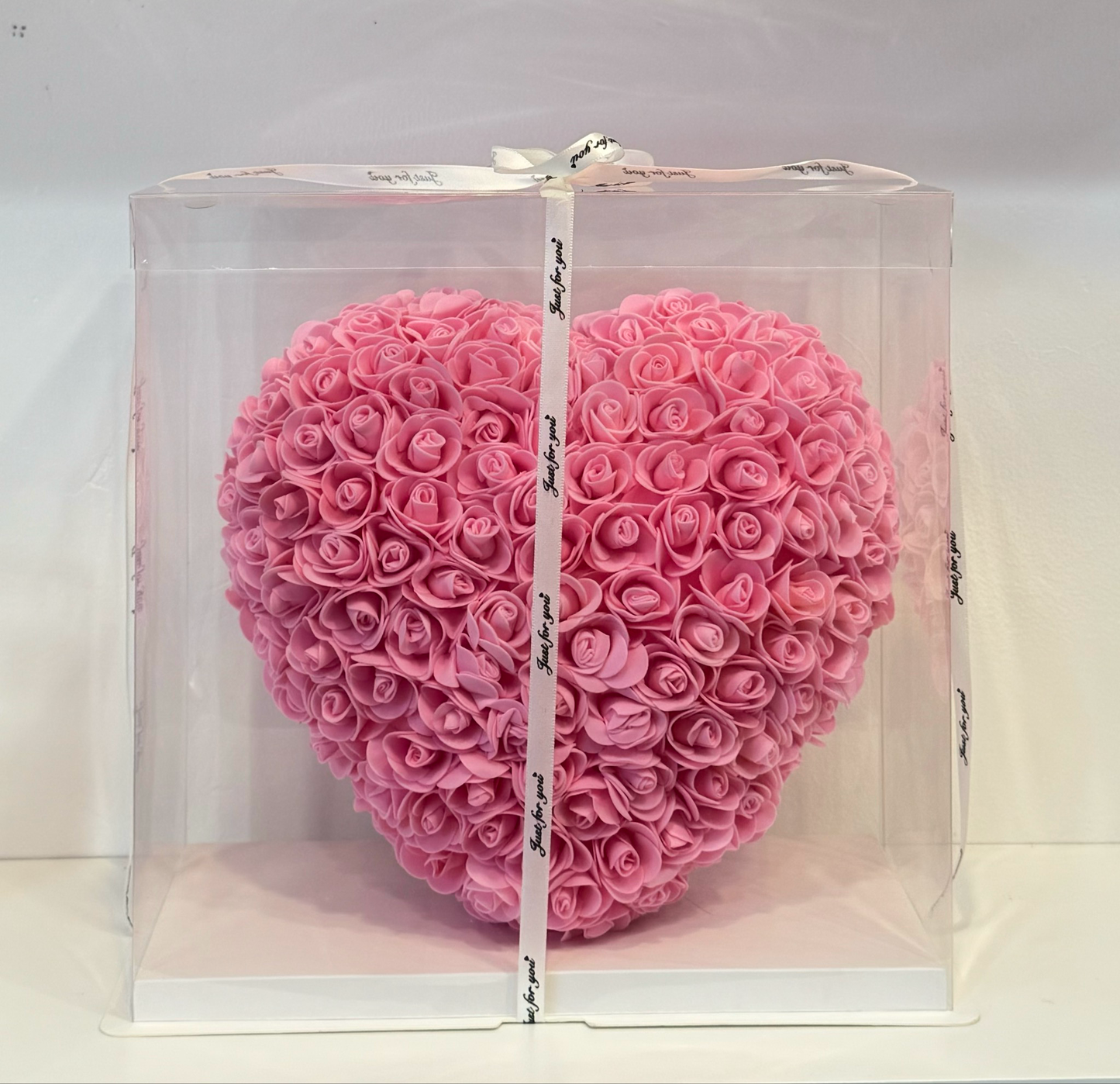 Heart shaped arrangement made of pink rose